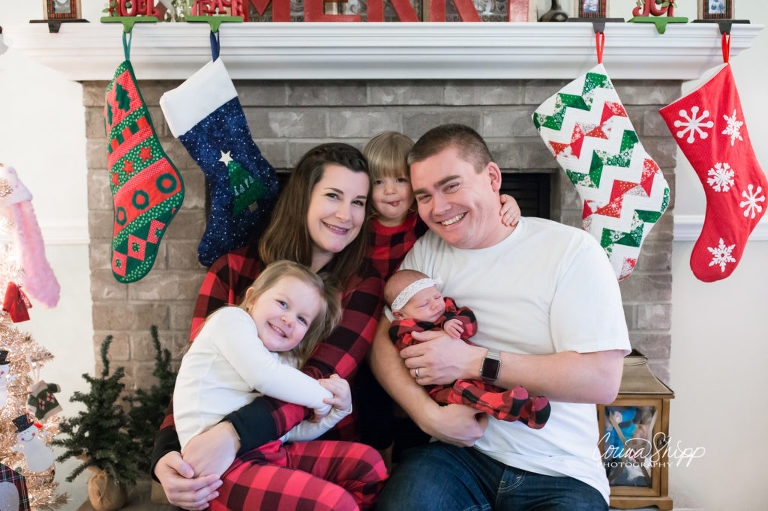 Newborn Lifestyle Photographer in Vancouver WA - family hanging Christmas stockings