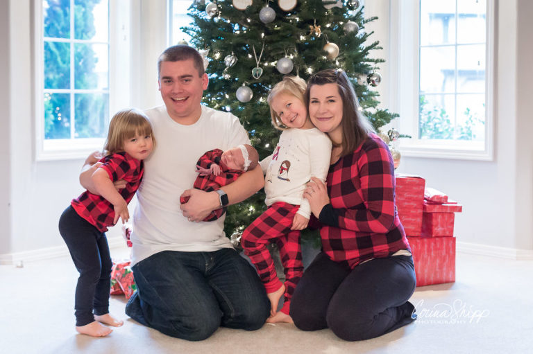Newborn Lifestyle Photographer in Vancouver WA - family portrait under the Christmas tree