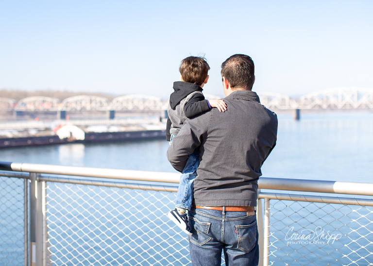Corina Shipp Photography-Vancouver Wa Family Photographer-father holding son and watching a passing barge on the river